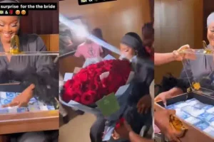 Beautiful bride smiles as groom gifts her with briefcase filled with money on wedding day (Video) 5 InCollage 20231210 123248520 768x384.jpg