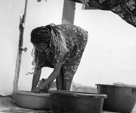 Wife cries out for advice as she finds pant in husband’s pocket during laundry 1 159662403 african woman hand washing laundry outdoors.jpg