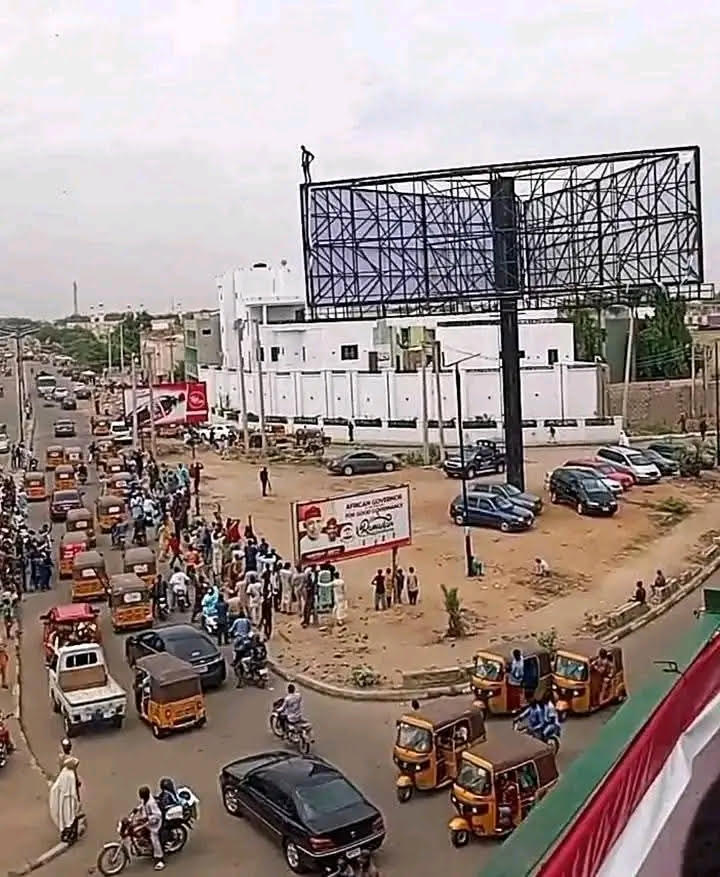 Tension in Kano as Man Climbs Billboard, Threatens to Jump 1 IMG 8490